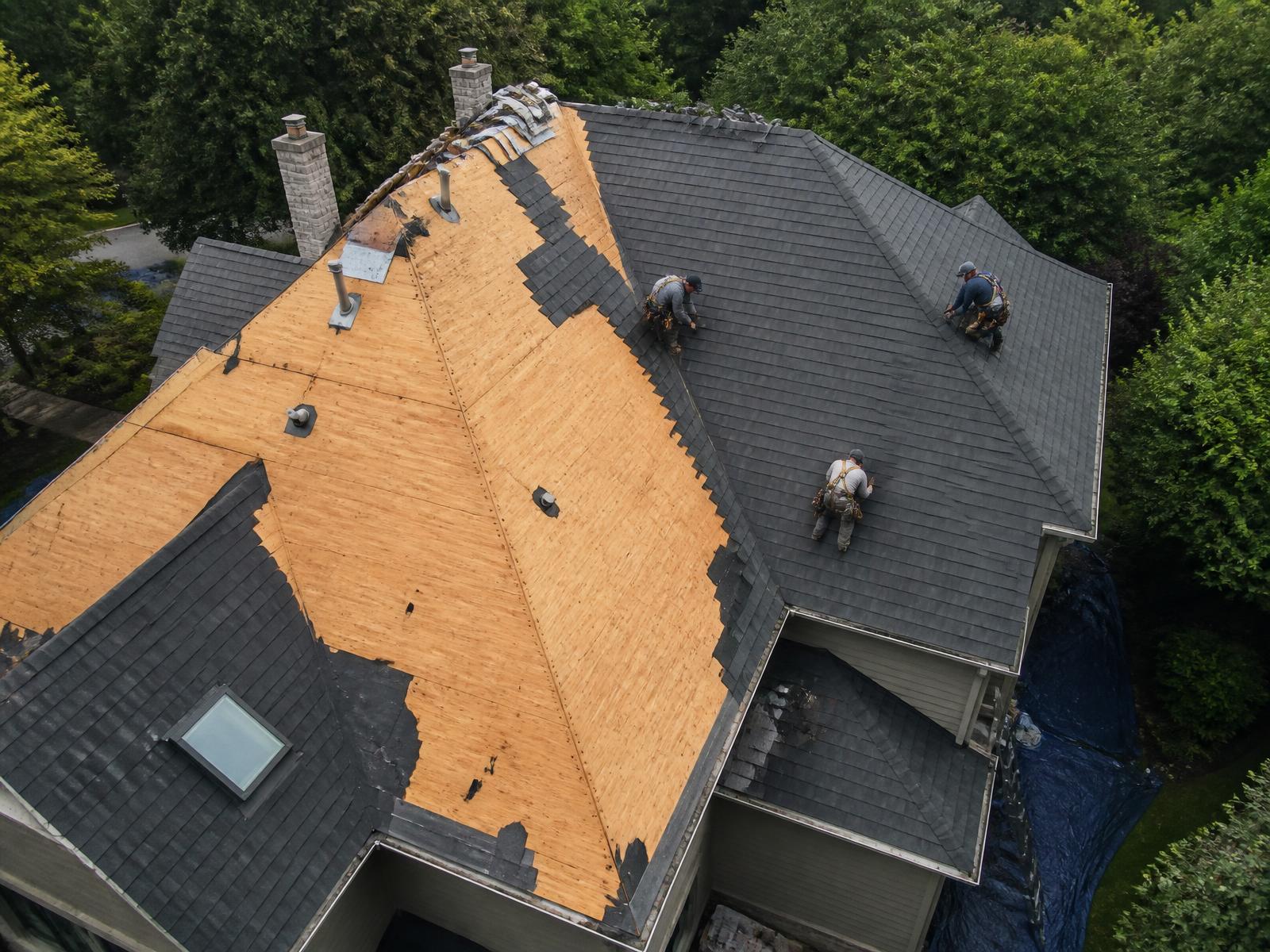 Complete residential roof replacement in progress